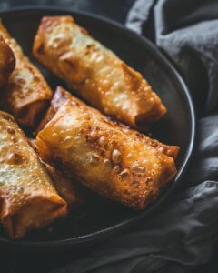 "Guide on how to reheat egg rolls for best texture and flavor."