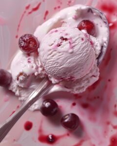 "Person preparing anabolic ice cream Greg Doucette recipe in a modern kitchen."