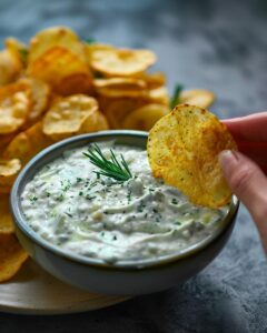 "Ingredients and steps laid out for a homemade chip dip recipe."