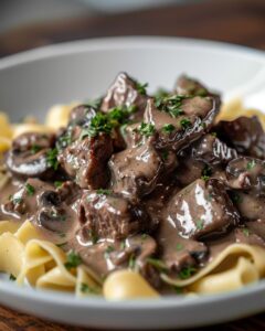 Homemade beef stroganoff recipe with easy-to-follow instructions and basic kitchen tools.