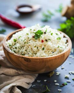 "Chef preparing Longhorn Steakhouse rice in a bustling kitchen environment."