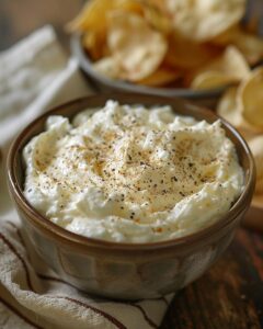 "Step-by-step preparation of 3 ingredient easy onion dip recipe in a white bowl."
